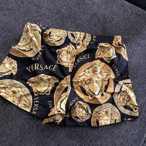 Men Versace swim shorts worn once.